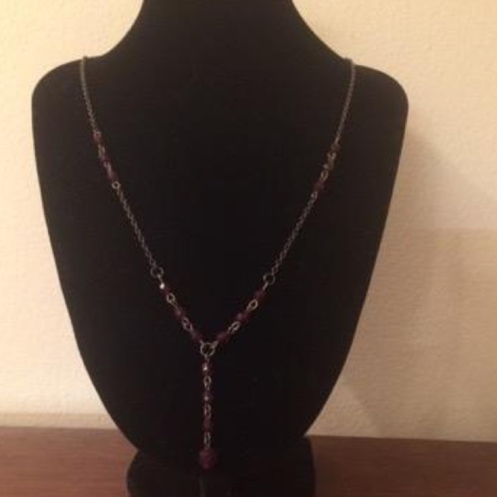 Red and golden beaded necklace.